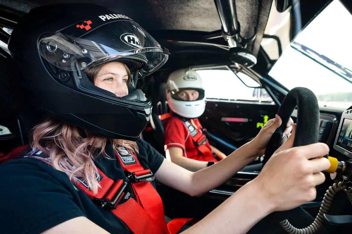 Instructor and guest in a Ginetta G56 GTA