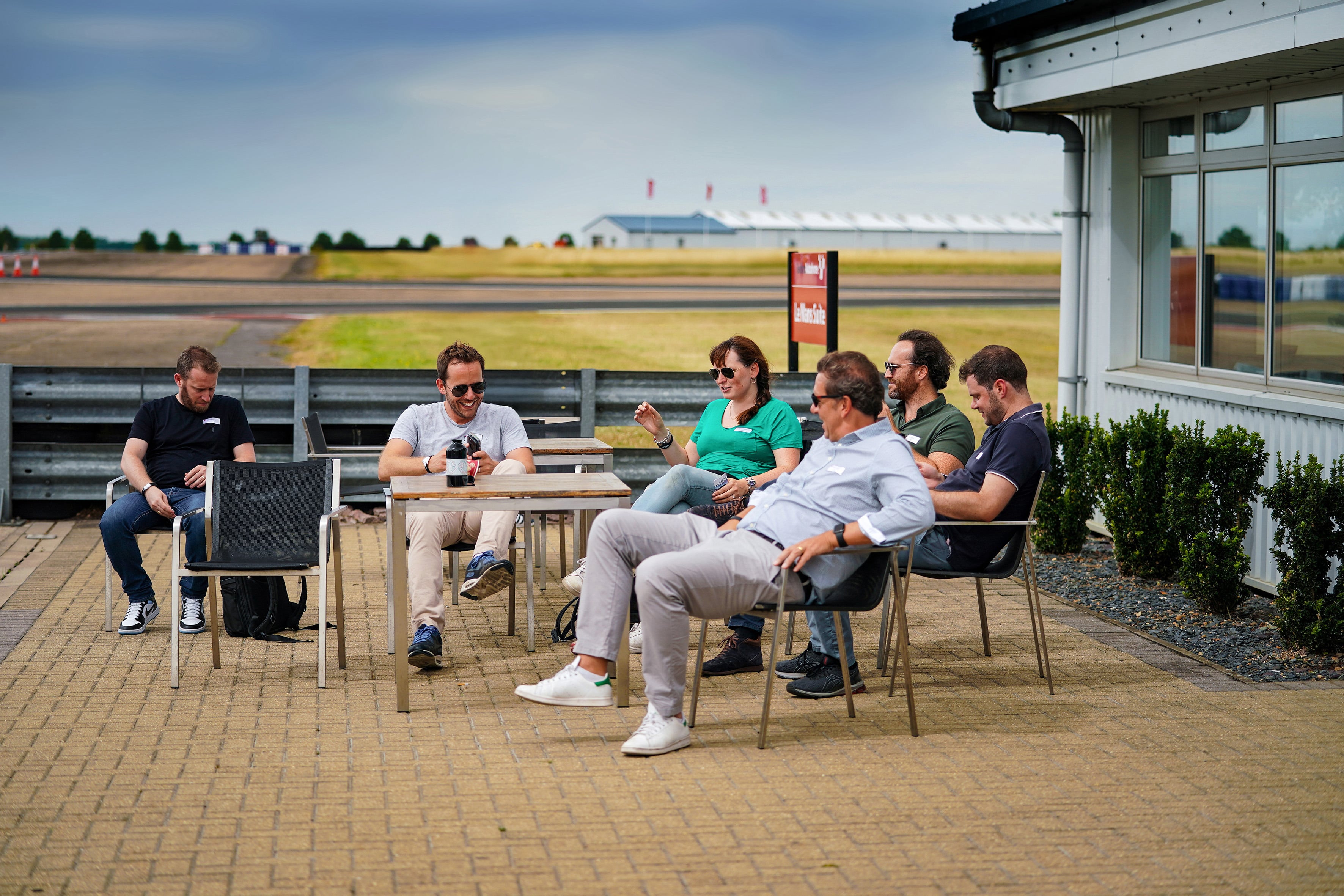 Guests chatting outside with some refreshments