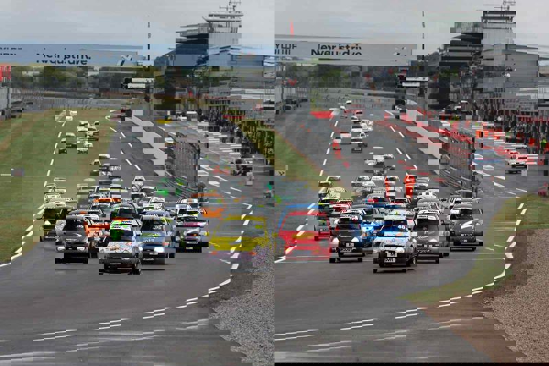 PRO-AM Racing win at Donington Park by less than ten seconds!