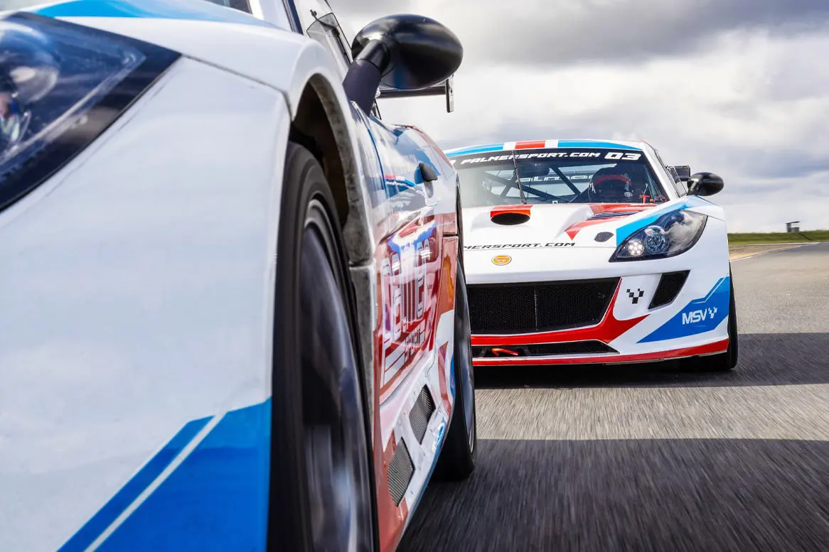 2 Ginetta G56 GTA in front of the other