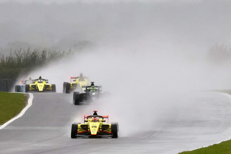 Phillips splashes to victory in GB4 Winter Series race two at Snetterton