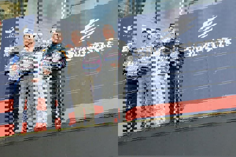 Teammates Share Spoils on Silverstone GP circuit Teammates Share Spoils on Silverstone GP circuit