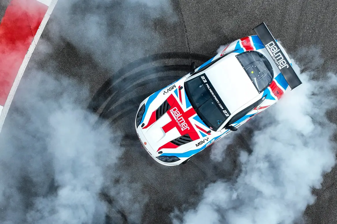Smoke from donuts in the Ginetta G56 GTA